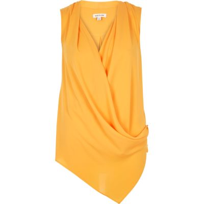 Orange wrap front sleeveless blouse